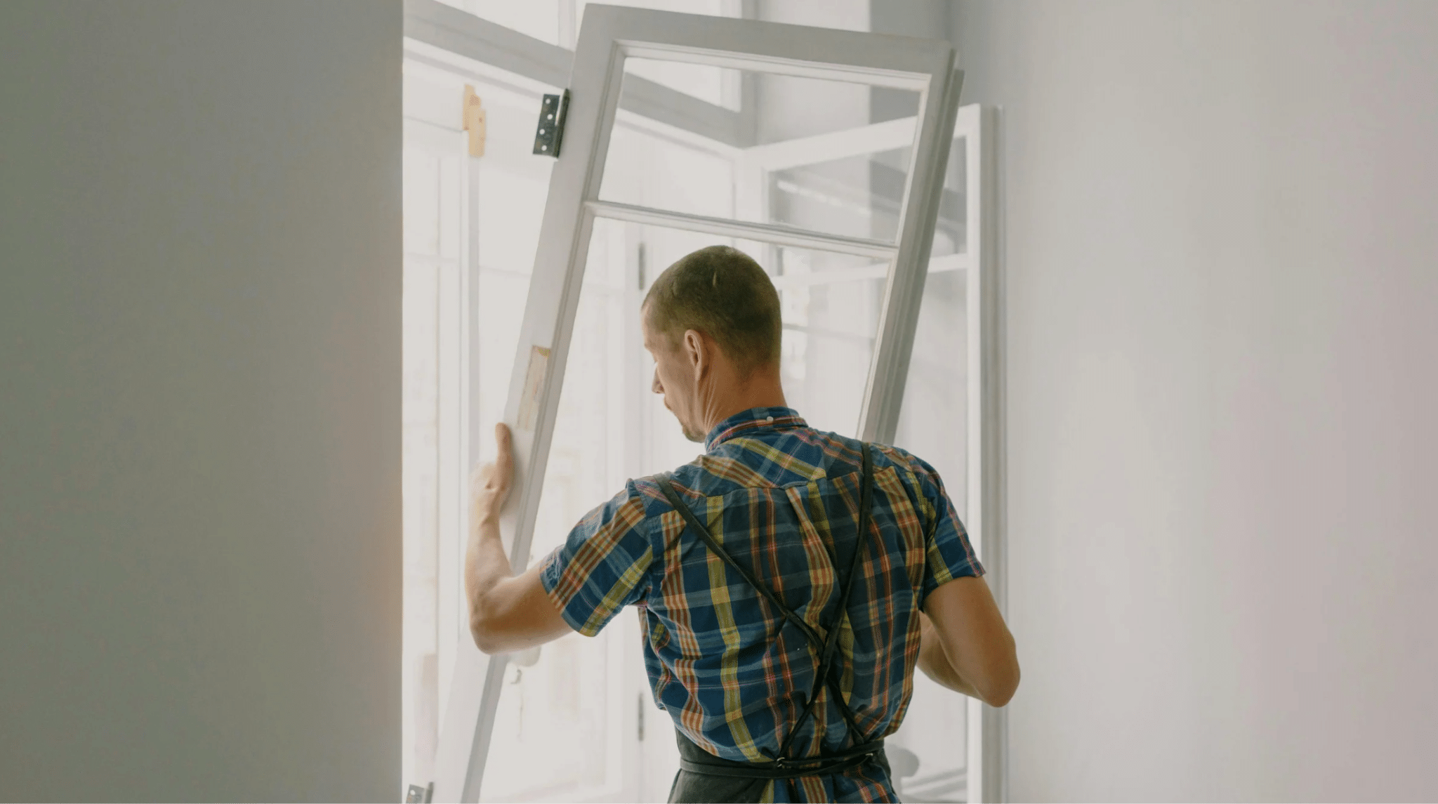 Homeowner checking a window before a home inspection